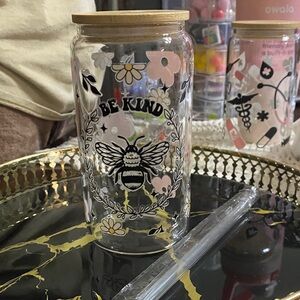 Bee Kind Glass cup with Bamboo Lid and plastic straw.